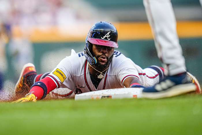 Jun 8, 2023; Cumberland, Georgia, USA; Atlanta Braves center fielder Michael Harris II (23) slides into third base against the New York Mets during the second inning at Truist Park. Mandatory Credit: Dale Zanine-USA TODAY Sports